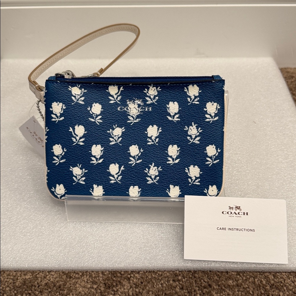 Coach Navy Floral Print Wristlet with Cream Strap - Picture 3 of 6